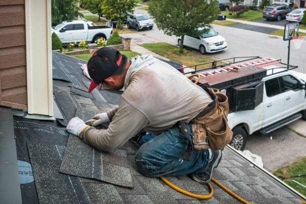 Professional Flat Roof Repair technician working in Dexter, OR
